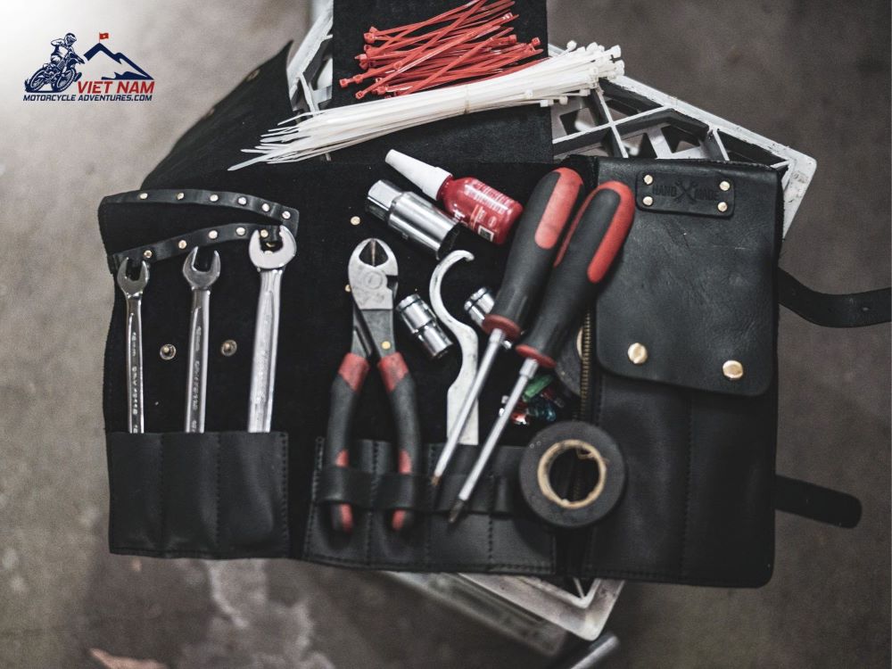 A small multi-tool with pliers, screwdrivers, and a knife can be useful for minor motorbike repairs